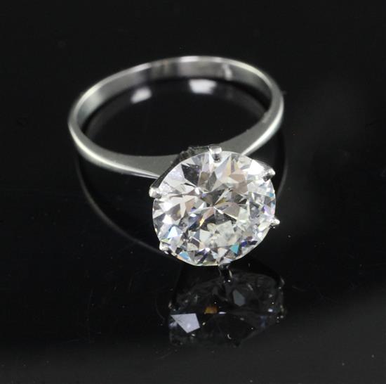 A platinum and solitaire diamond ring